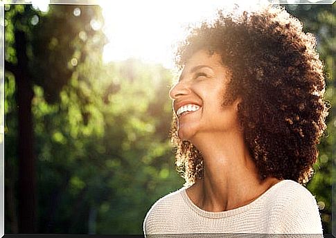 Woman reflecting happiness on her face