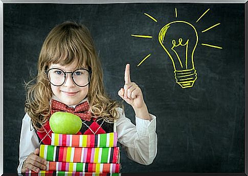 Creative girl with colored books symbolizing how resilient brain in children