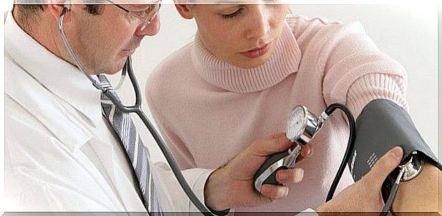 Doctor measuring blood pressure to his patient