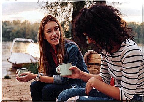 Girls talking in the field symbolizing ecpathy 