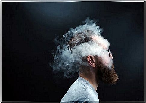 Man surrounded by smoke symbolizing hidden anger