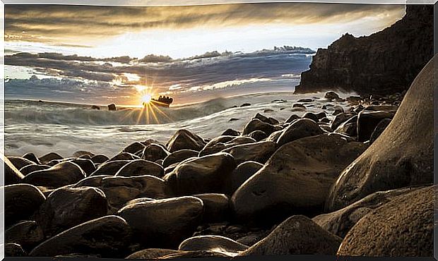 beach at sunrise to represent injured people