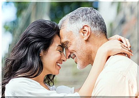 Adult couple looking into each other's eyes with kindness