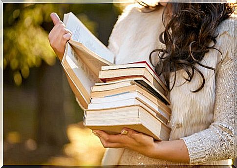 Woman reading poetry books