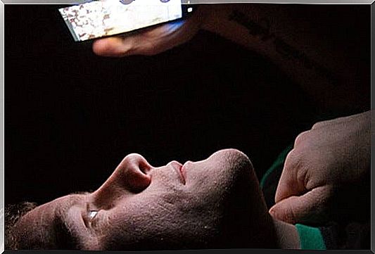 man suffering from technological insomnia