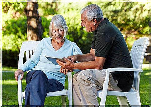 Senior couple learning with a tablet