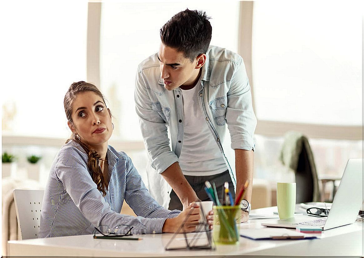 Woman ignoring her coworker