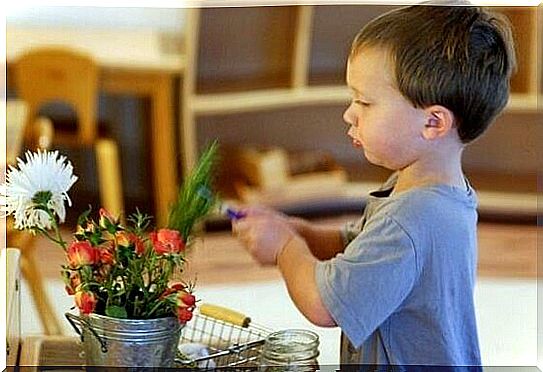 Child caring for plant